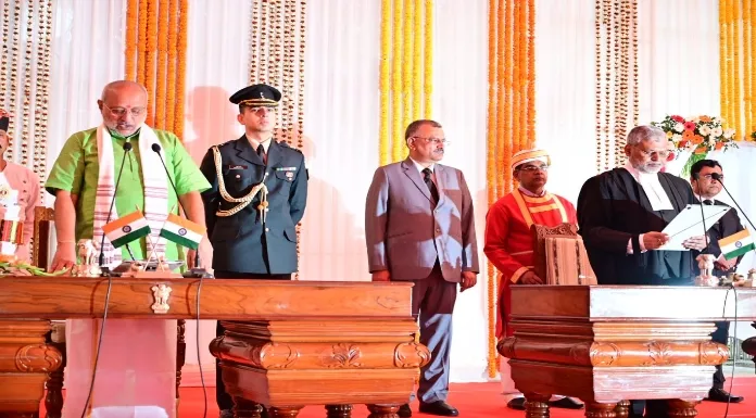The Governor administered the oath to the new Chief Justice